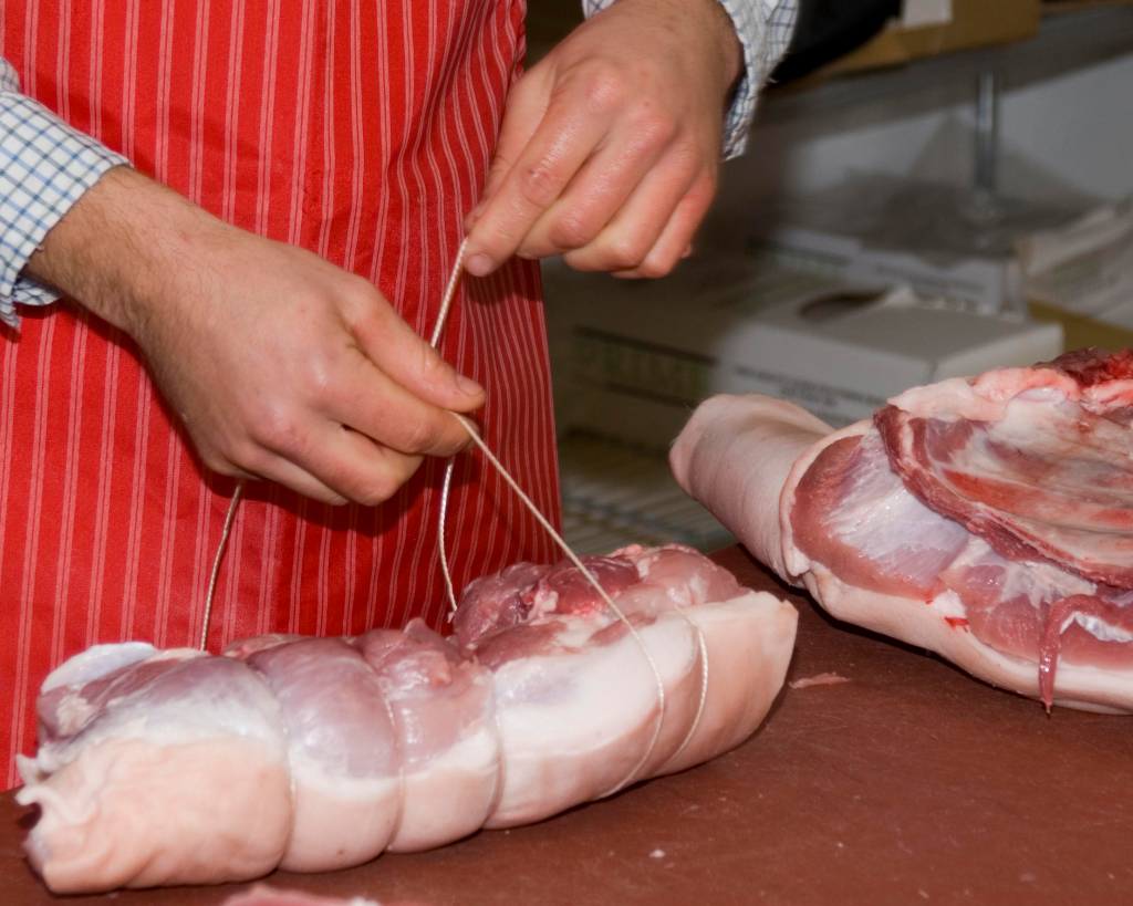 hands on pork butchery